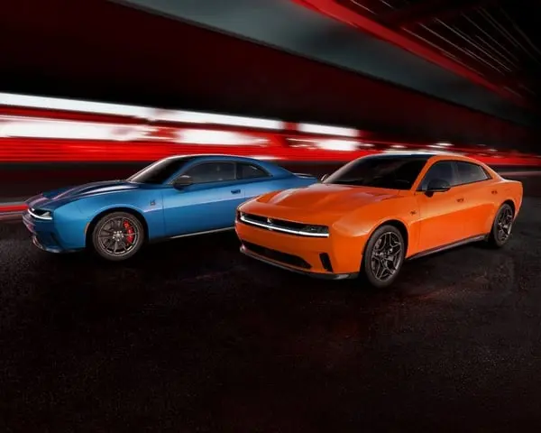 A pair of electric Dodge Charger models.