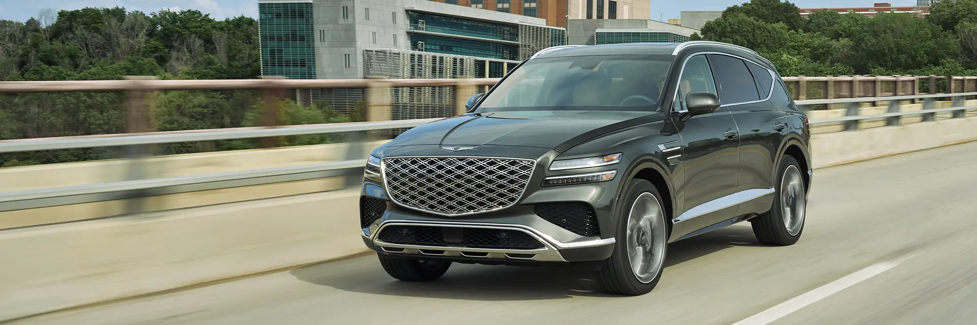 Family sitting in the back of an SUV