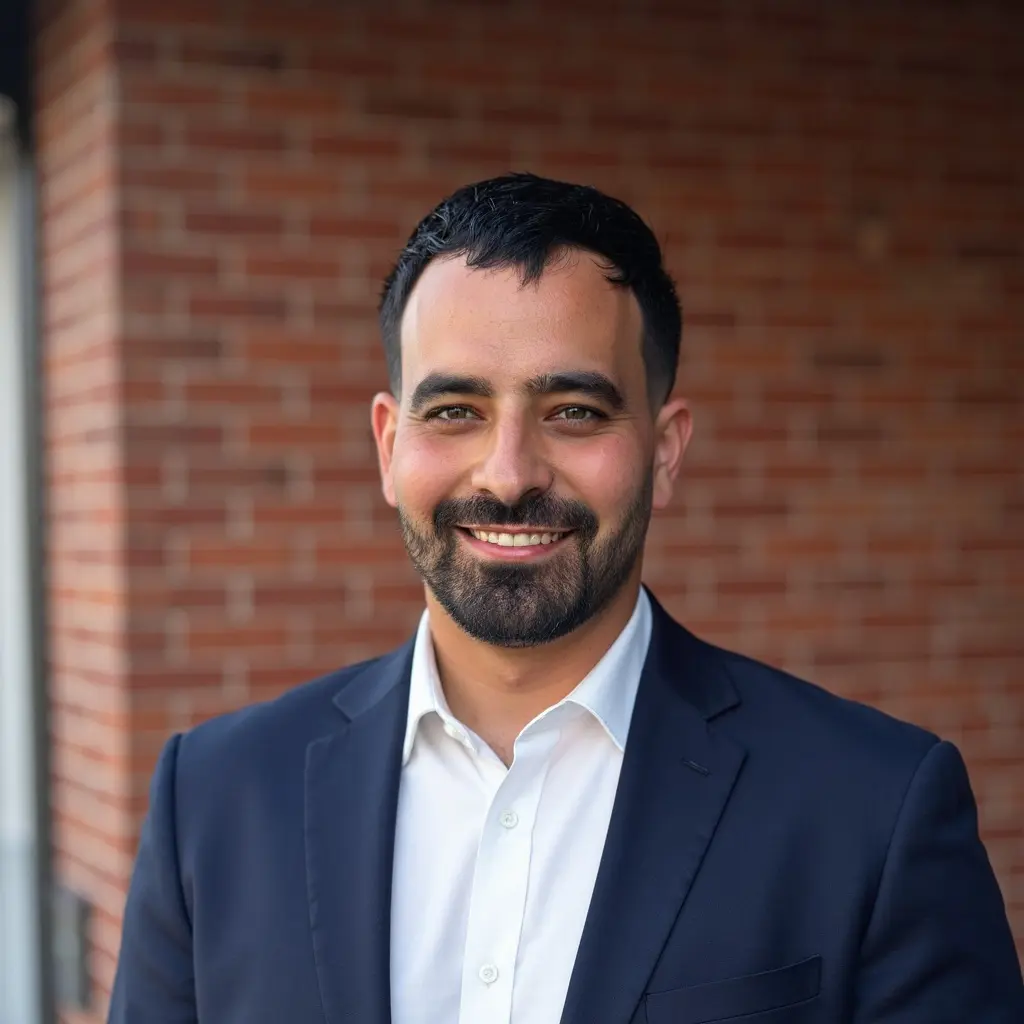 JOHN TAHHAN