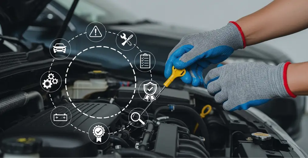 Vehicle protection plan service inspection with technician checking an engine at Autos of Chicago