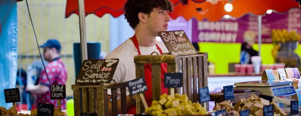 A vendor at a food hall.