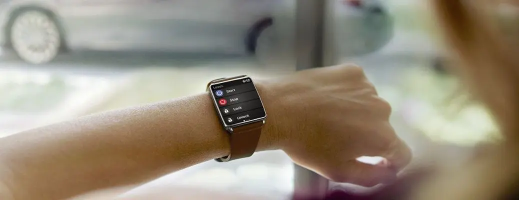 A person using the Lexus Enform app on their smartwatch.