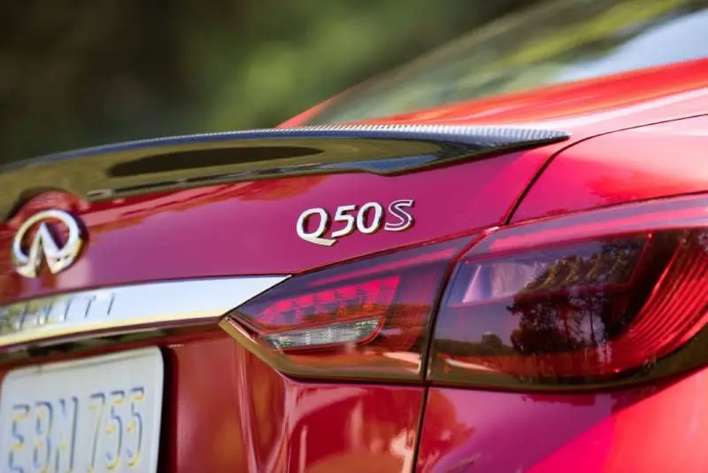 The tail and badge on the Infiniti Q50.