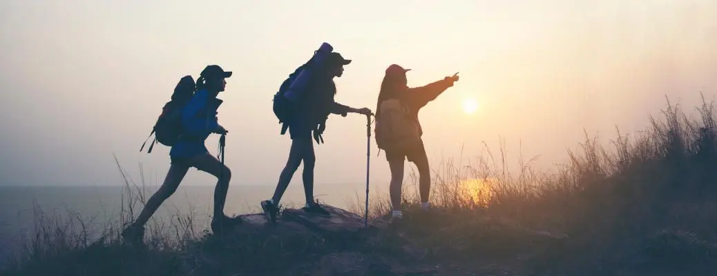 Hiker with backpack relaxing young woman hiking holiday, wild ad