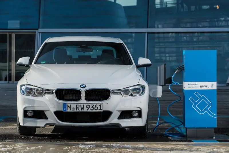 2016 BMW 330e iPerformance exterior front while charging.