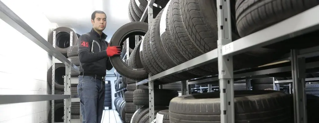 A man in a tire shop.