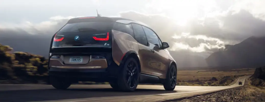 A rear quarter exterior view of the BMW i3 EV.