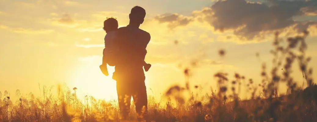 Dad and son in the park. father's day silhouette happy family child dream concept. father carries his son on his back. dad playing with his son in nature in the park silhouette at sunset lifestyle