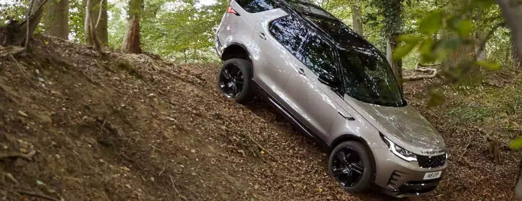 Land Rover Discovery Sport driving down hill
