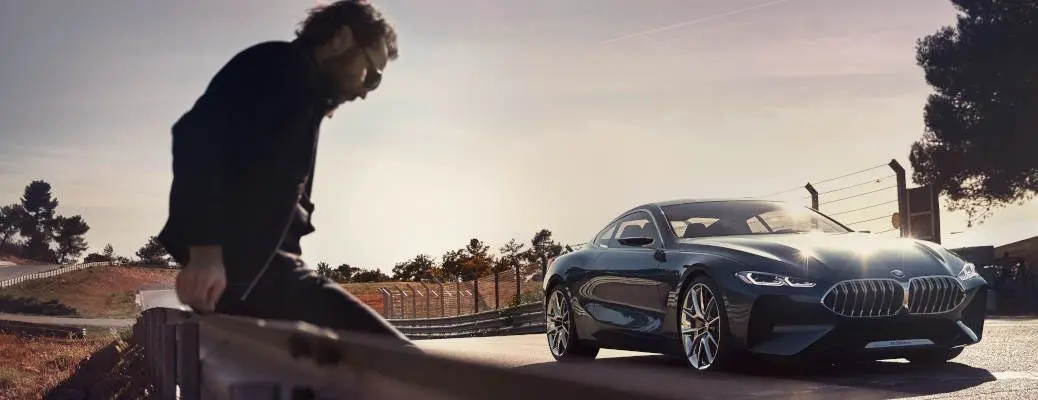 2018 BMW 8 Series Concept driving down a road