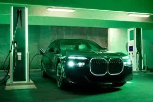 A BMW EV at a charging station.