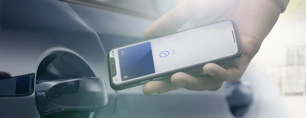 A man using the BMW digital key.