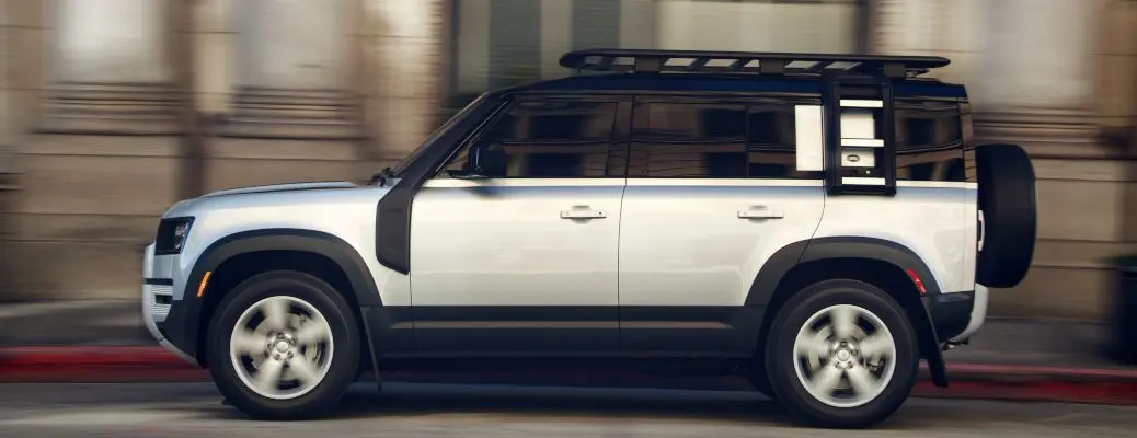 The Land Rover Defender on city streets.