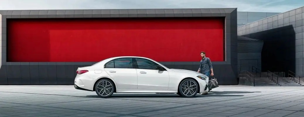 A side exterior view of a Mercedes C Class sedan.