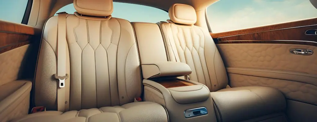 ,leather seats in a luxury car wide, clean; leather interior, car passenger and driver seats, angle view, sunroof, buttons, dashboard, beige nappa leather.