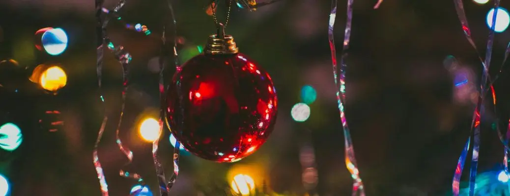 Christmas ornaments on a tree.