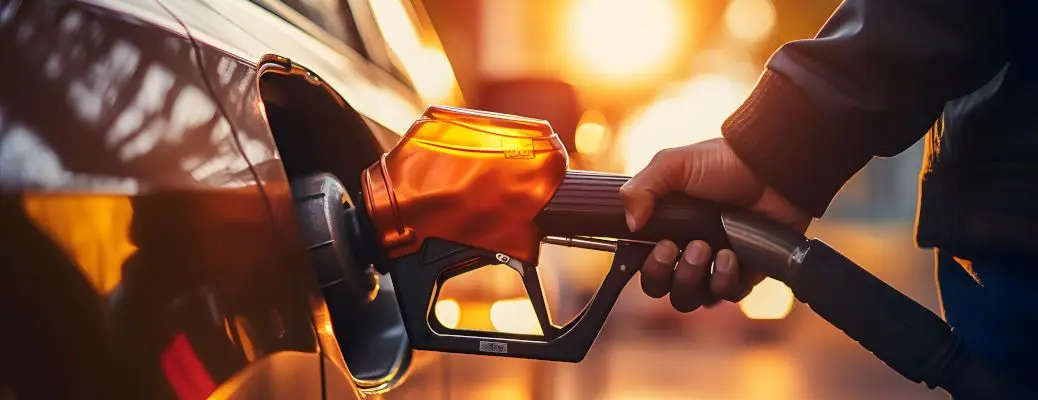 Gold Fuel Pump Filling Up a Car