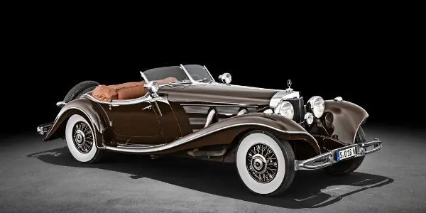 Brown 1934 Mercedes-Benz 500 K Special Roadster on Black Background