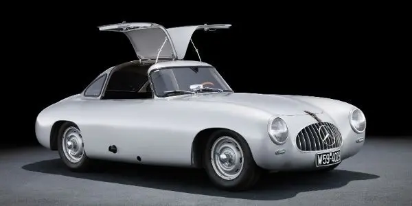 Silver 1952 Mercedes-Benz 300 SL on Black Background