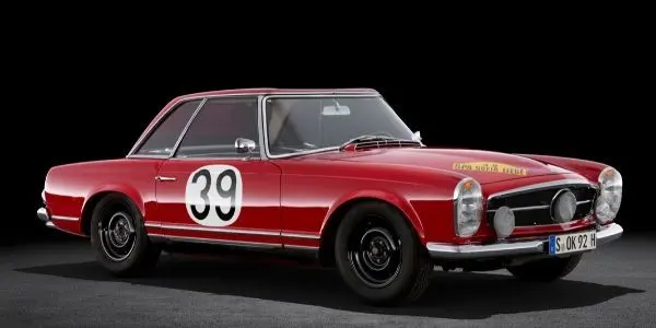 Red 1963 Mercedes-Benz 230 SL Pagoda on Black Background