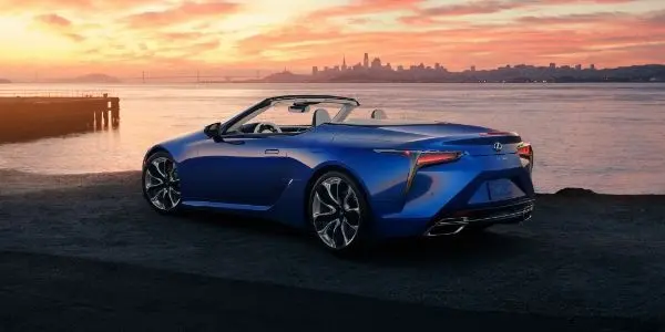 Blue 2021 Lexus LC 500 Convertible Rear Exterior at a Pier at Sunset