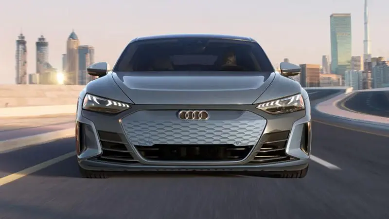 An Audi driving on the freeway.