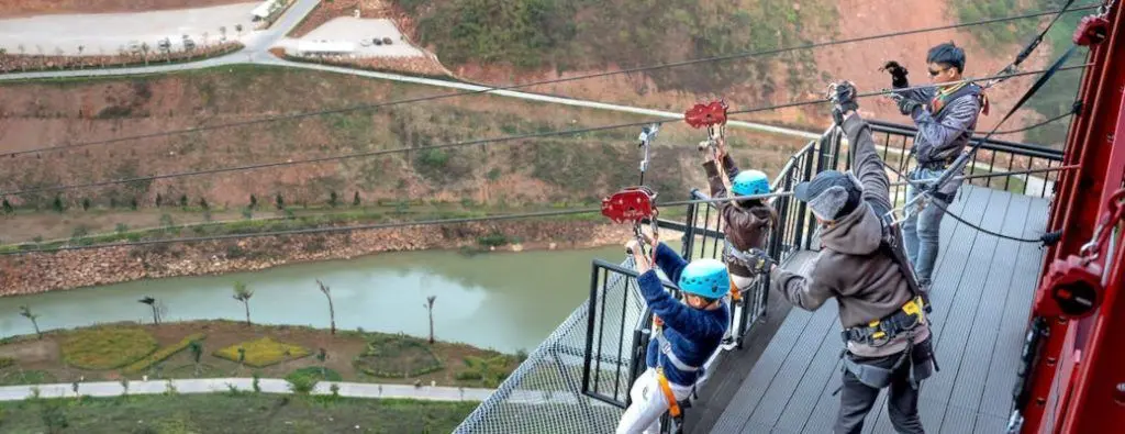 Kids about to go ziplining at one of the top 3 spots near Dallas.
