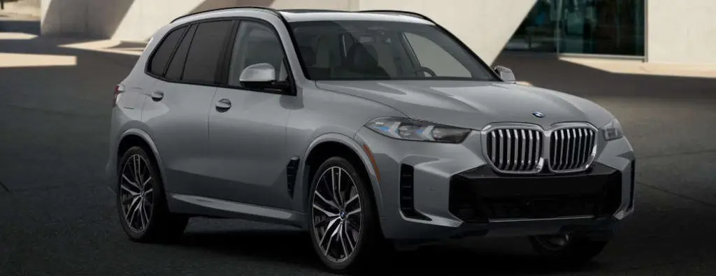 A front exterior view of the 2025 BMW X5, one of the models available used at Autos of Dallas.