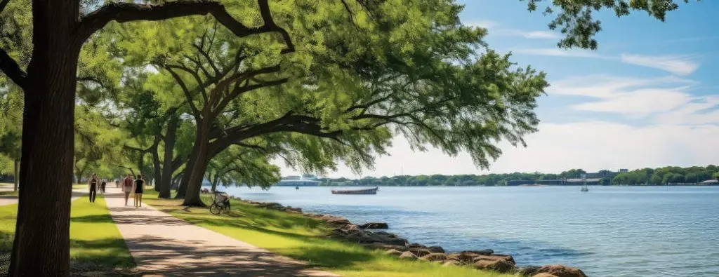 A serene lake setting with oak trees and shade near Dallas, TX.