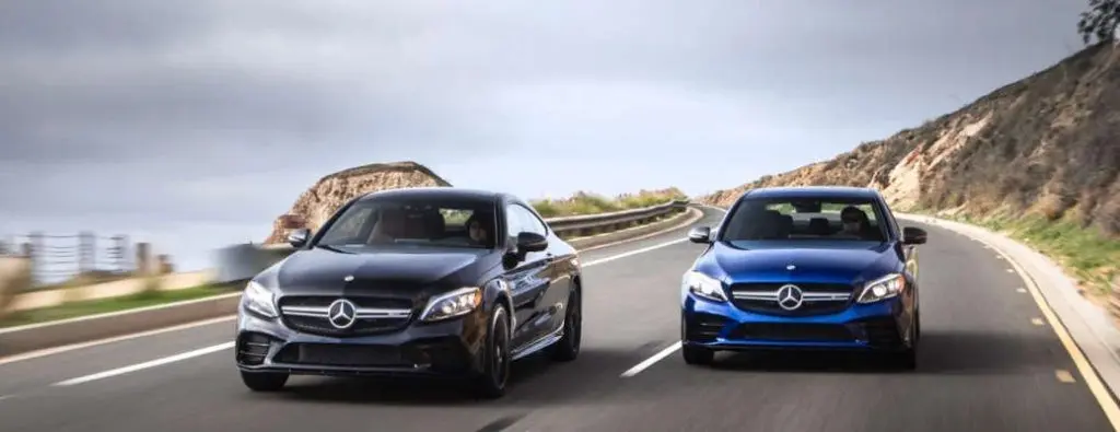 Two Mercedes-Benz sedans with 4MATIC®, the company's proprietary AWD system.