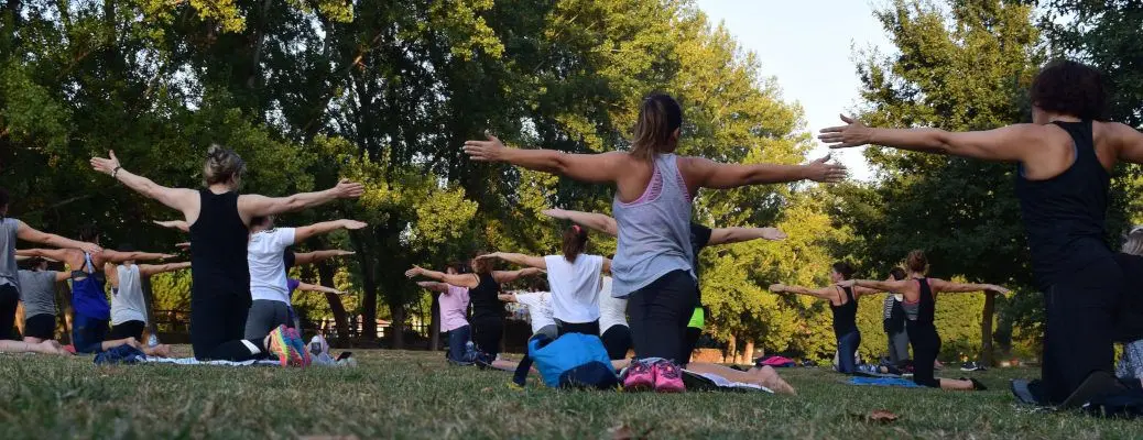 People taking a yoga class at one of the Top 3 places to hit your New Year's fitness goals near Dallas.