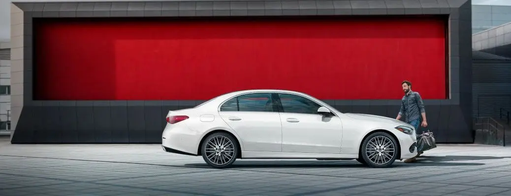 A side view of a Mercedes C-Class sedan.