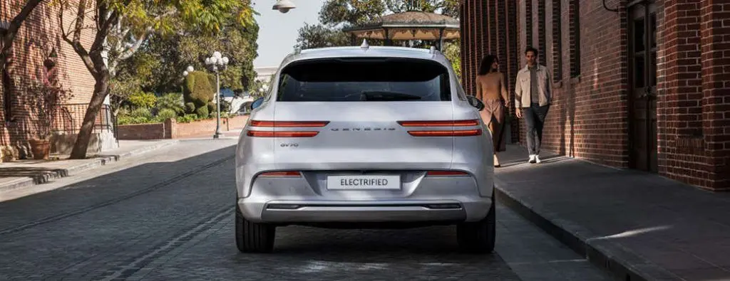 A rear view of the Genesis GV70 electric.