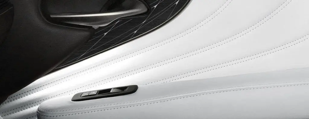 A detail of the leather interior of a Lexus.