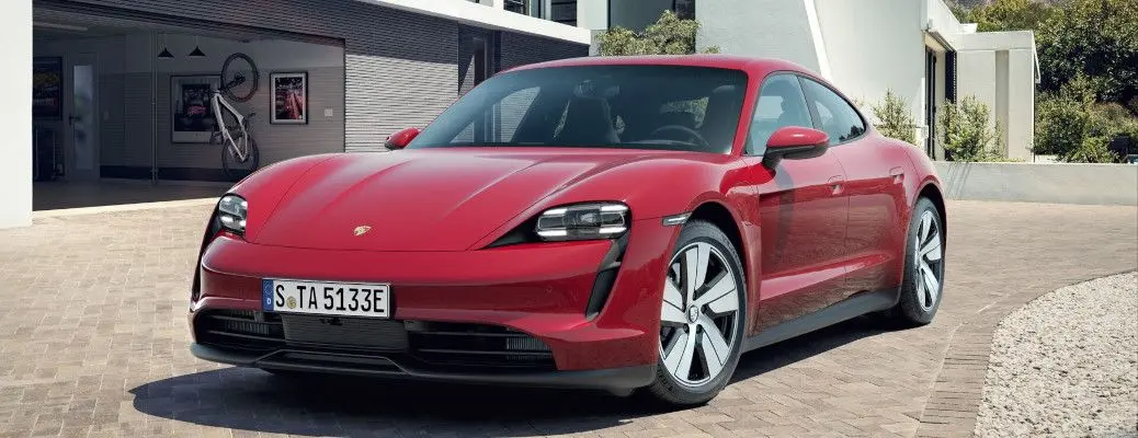 A front view of the Porsche Taycan, which can be found pre-owned at Autos of Dallas.