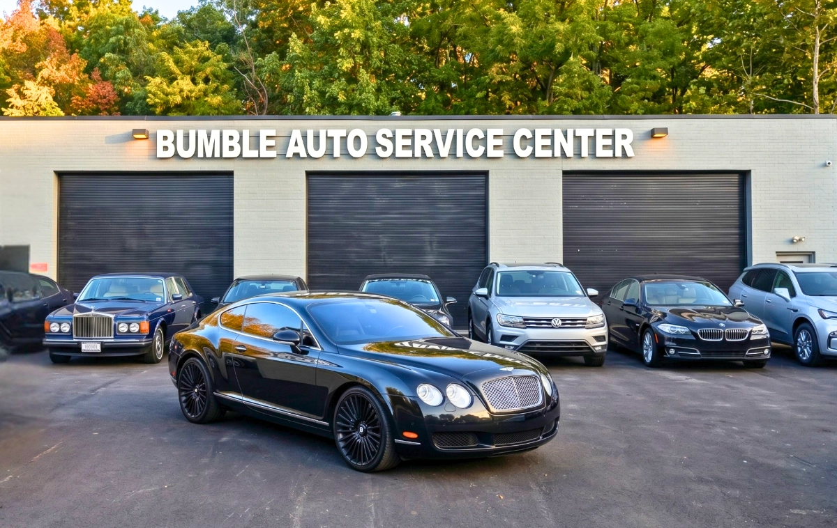 The Bumble Auto Service Center and Inspection lot storefront with a group of parked cars.