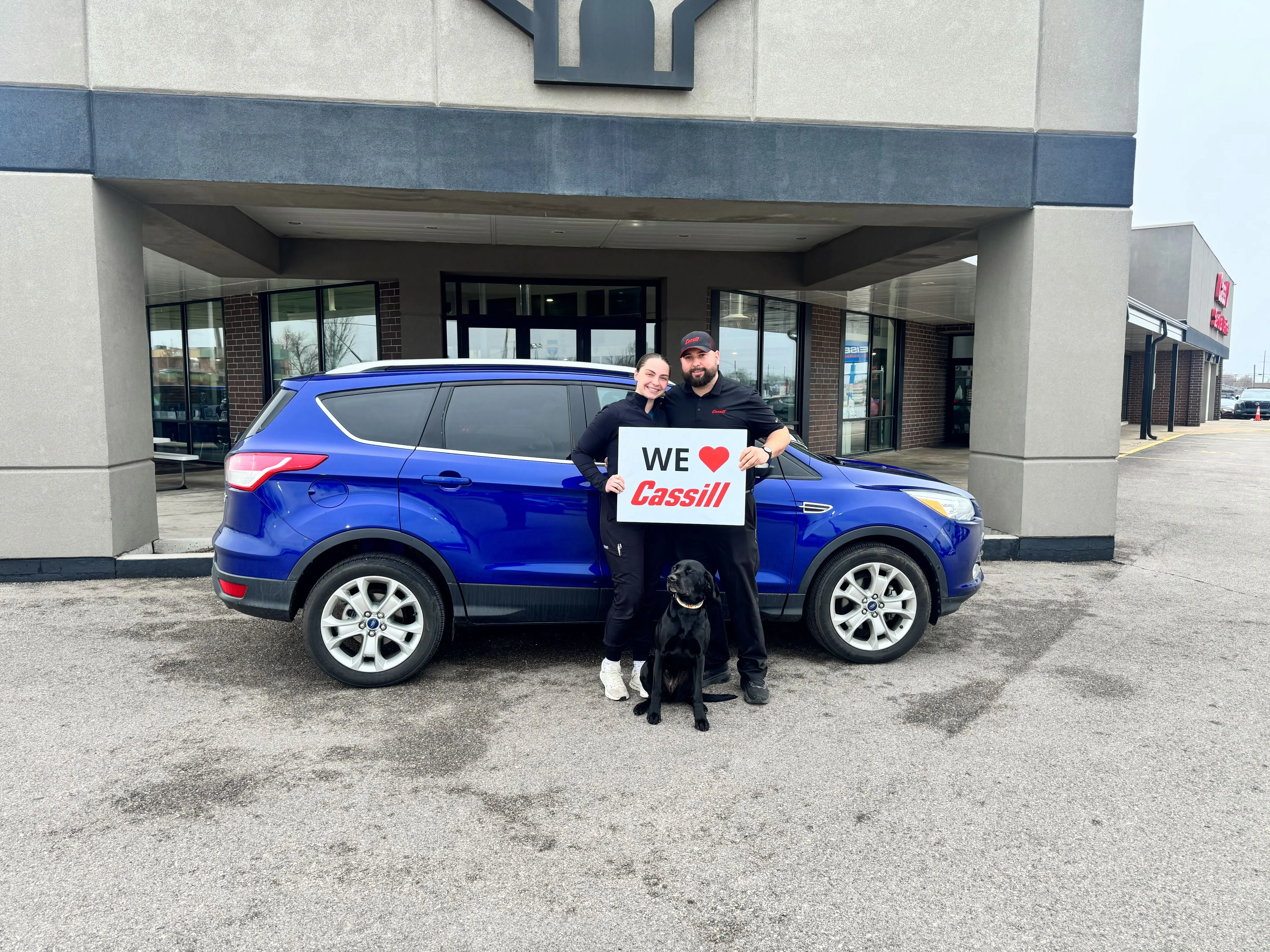 Cassill Motors customer with car