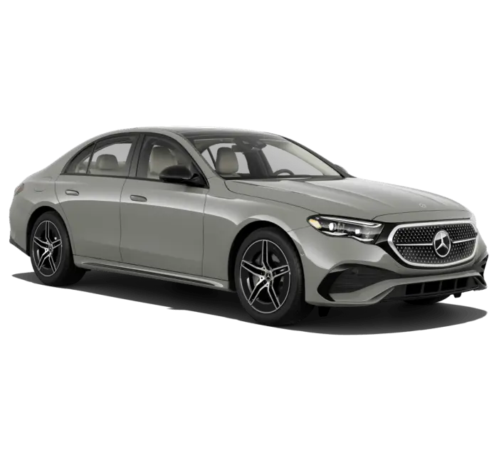 26 Mercedes-Benz E 450 4MATIC Sedan in Alpine Grey in three quarter.