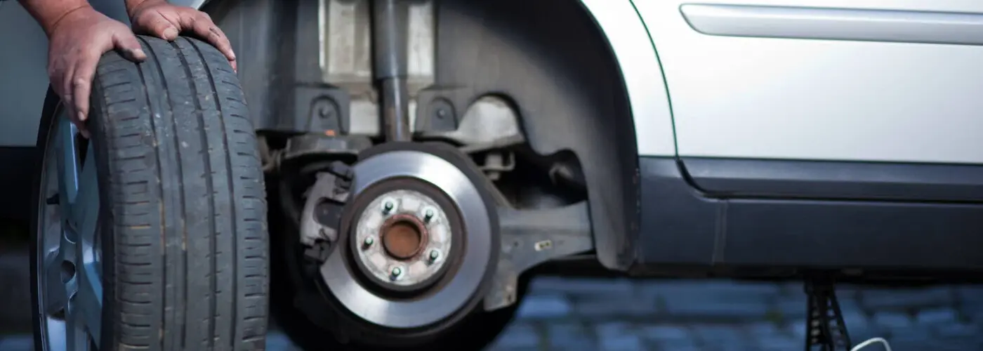 A tire being changed on a car.