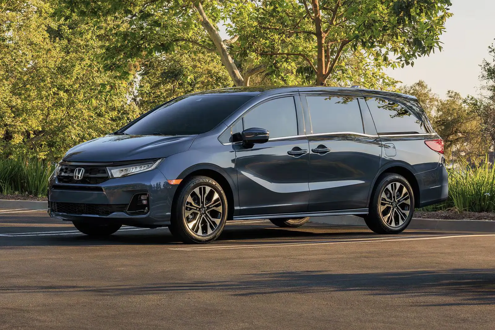 A honda odyssey sitting parked.