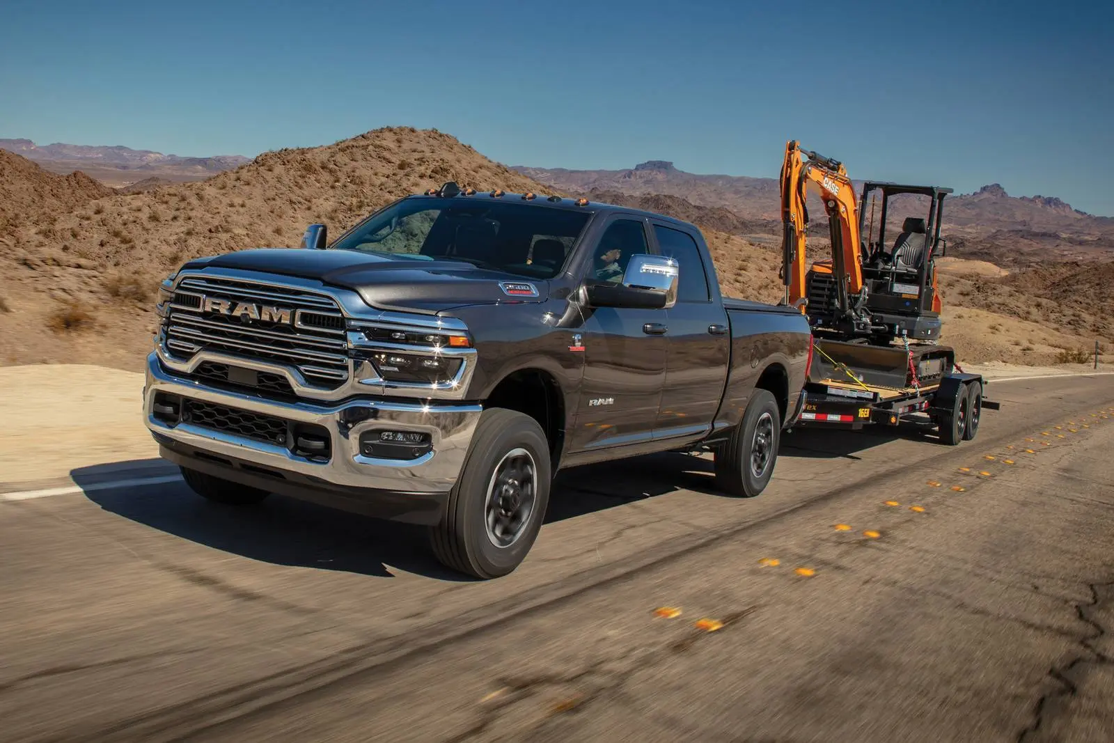 a ram 3500 pulling a mobile home.