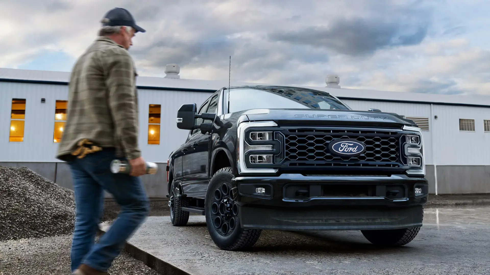 ford super duty parked next to a business