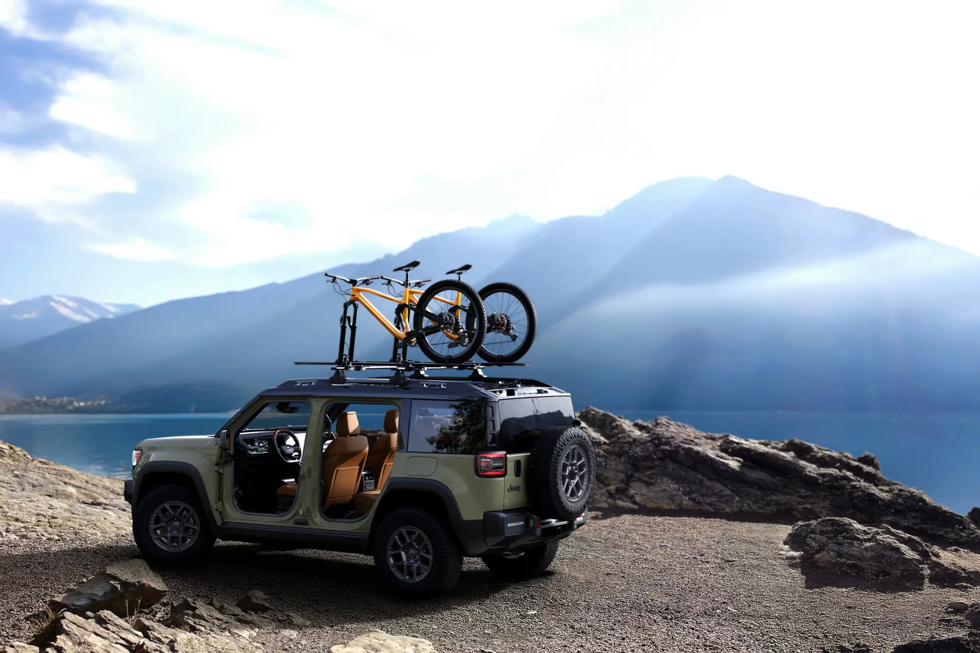 A jeep recon sitting parked off-road.