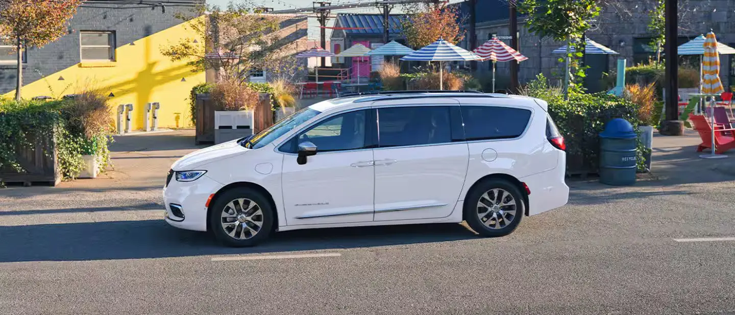 a white van sitting parked.