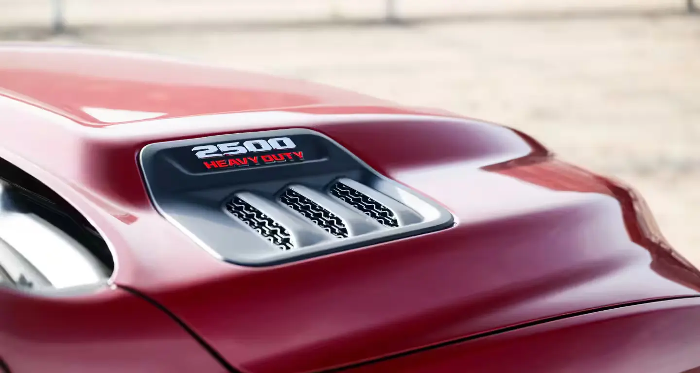 ram 2500 heavy duty emblem on the hood of a 2027 ram 2500 truck