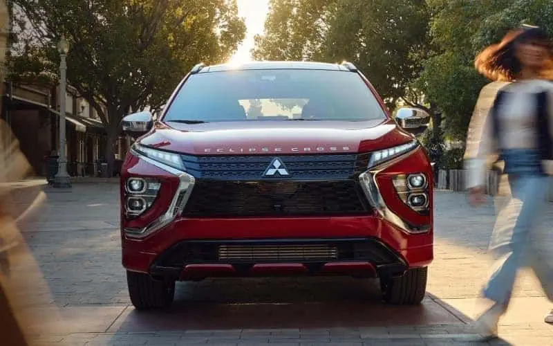 Red Mitsubishi Vehicle on the Highway
