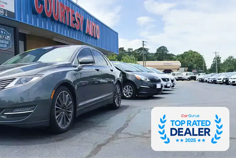 Courtesy Auto Sales dealership lot in Chesapeake, VA with 2025 CarGurus Top Rated Dealer badge