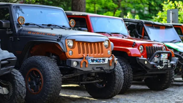 Custom Jeep Wranglers in a parking lot