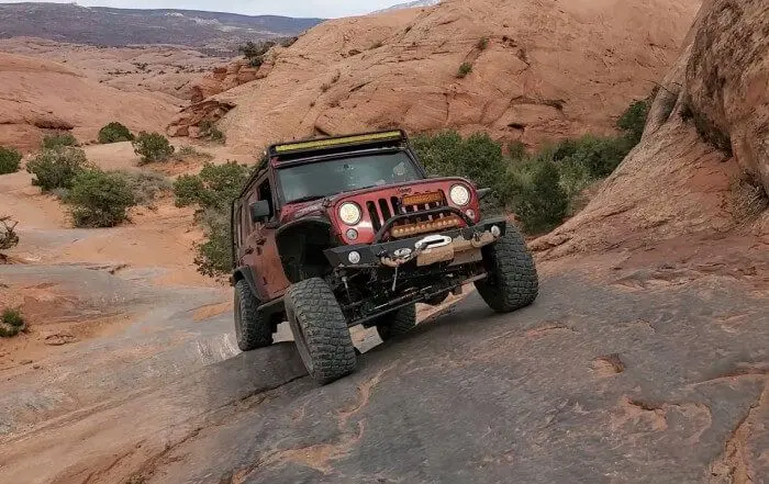 Reliable Jeep Climbing on a rocky trail