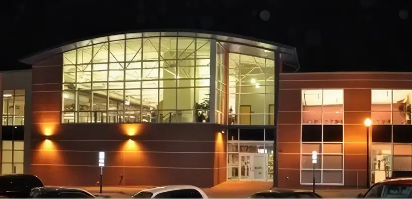 Dale Howard dealership building exterior lit up at night